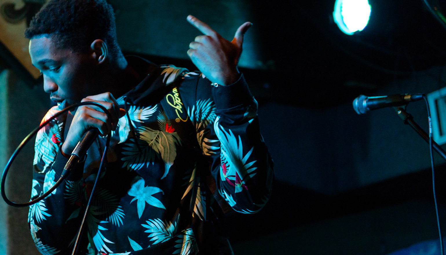 student performing on stage