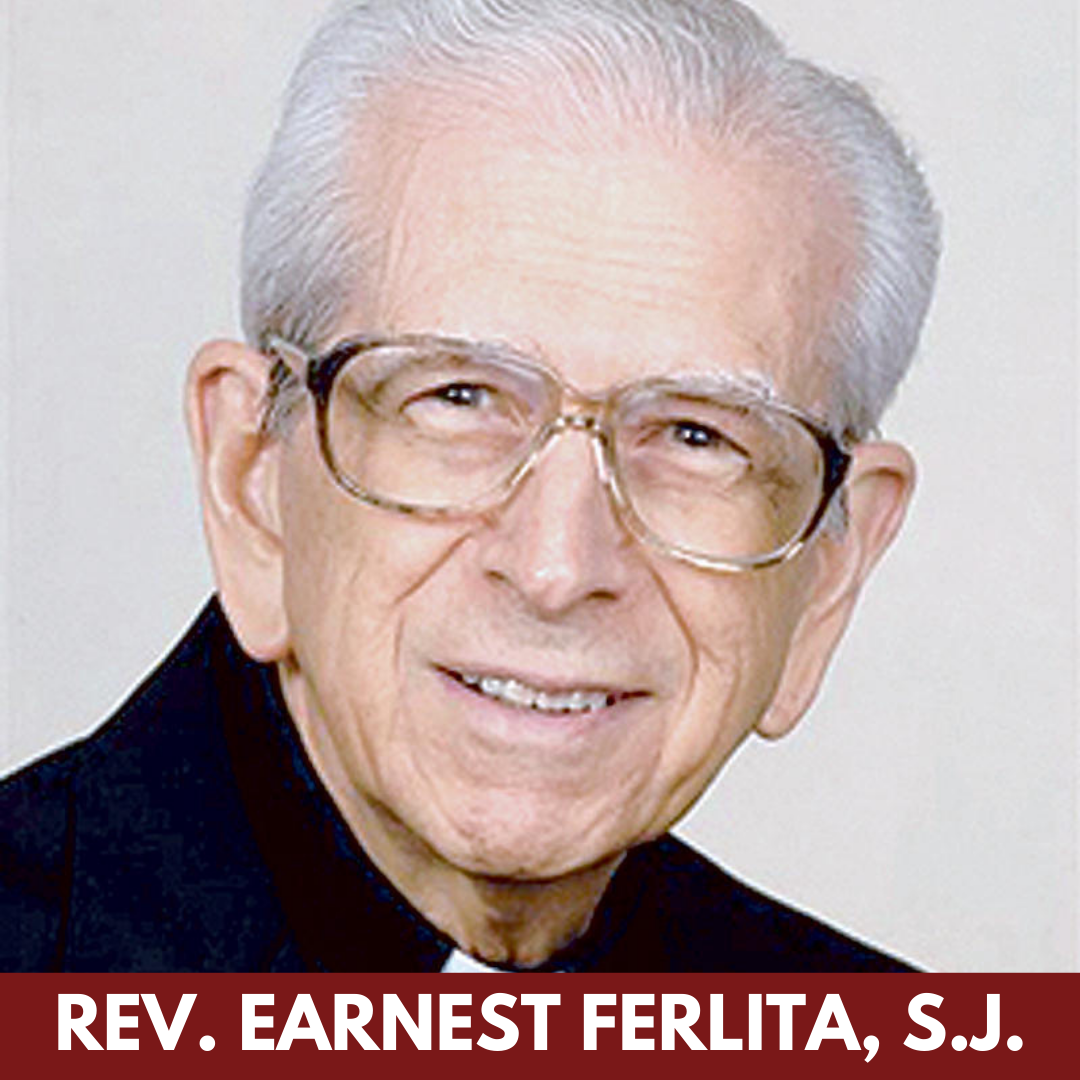 An older man with white hair and metal-rimmed glasses. He wears a priest collar.
